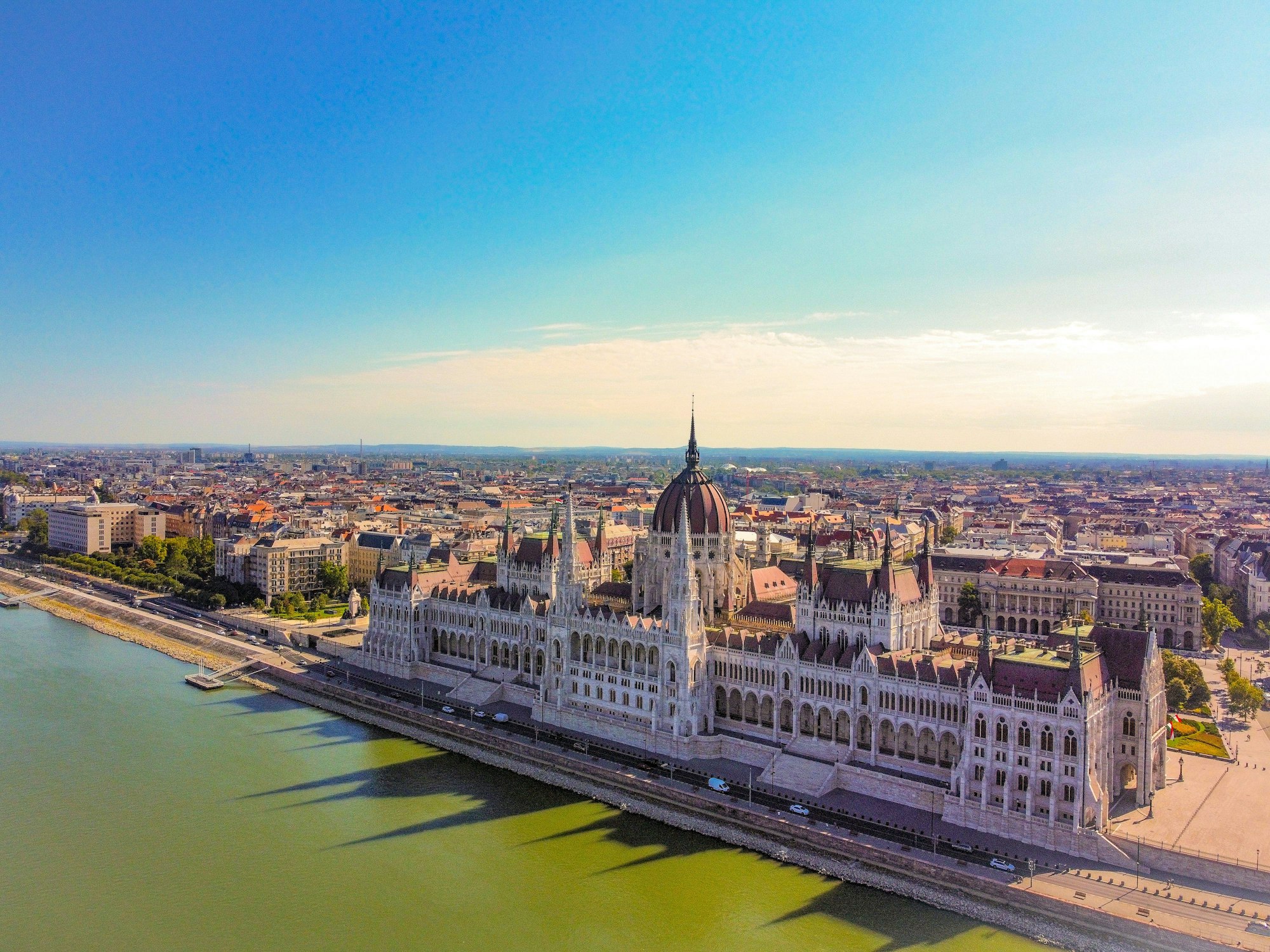 Aerial view of Hungarian Parliament Building reflecting on the river in Hungary